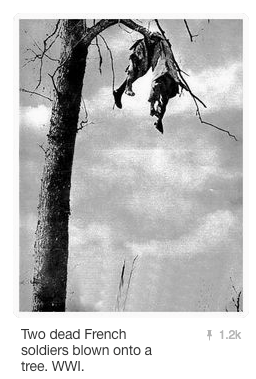 Image of two French soldiers blown into a tree by artillery